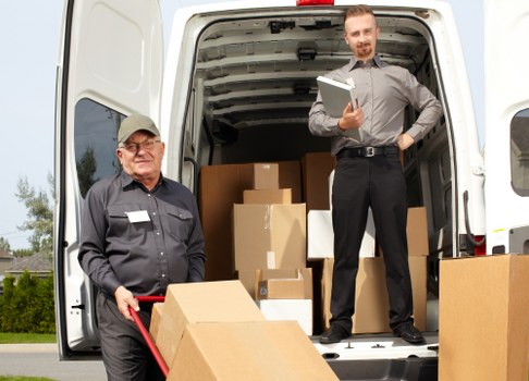 Student removals team helping with boxes and furniture in Bermondsey