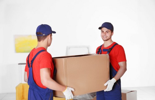 Removal van loading furniture for a Bermondsey home move