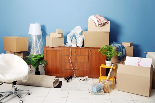 Packed boxes and furniture ready for a same day move in a Bermondsey flat